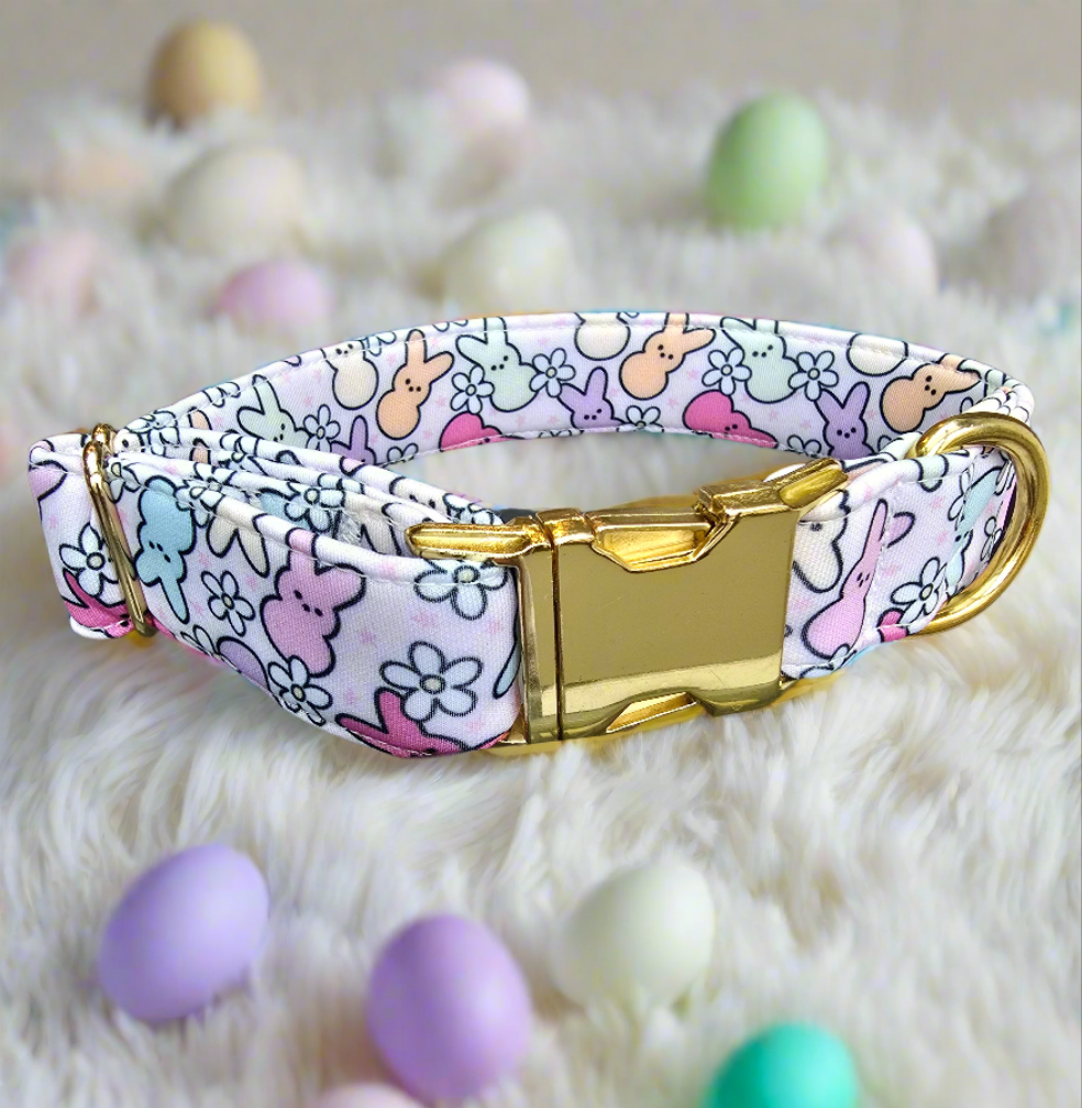 Adjustable neoprene dog collar featuring a pastel Easter Peeps bunny pattern, displayed on a soft faux fur background.