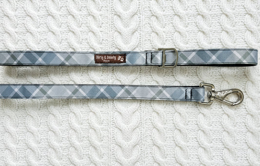 Dirty & Dainty Paws Boho Blue Plaid Dog Leash featuring a stylish plaid pattern, durable metal clasp, and a built-in bottle opener. Made from repurposed bicycle tires.