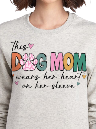 "This Dog Mom Wears Her Heart On Her Sleeve" in Oatmeal Heather Personalized Dog Name Sweatshirt in Oatmeal Heather| Custom Dog Mom Sweatshirt – Personalized Paw Prints & Name