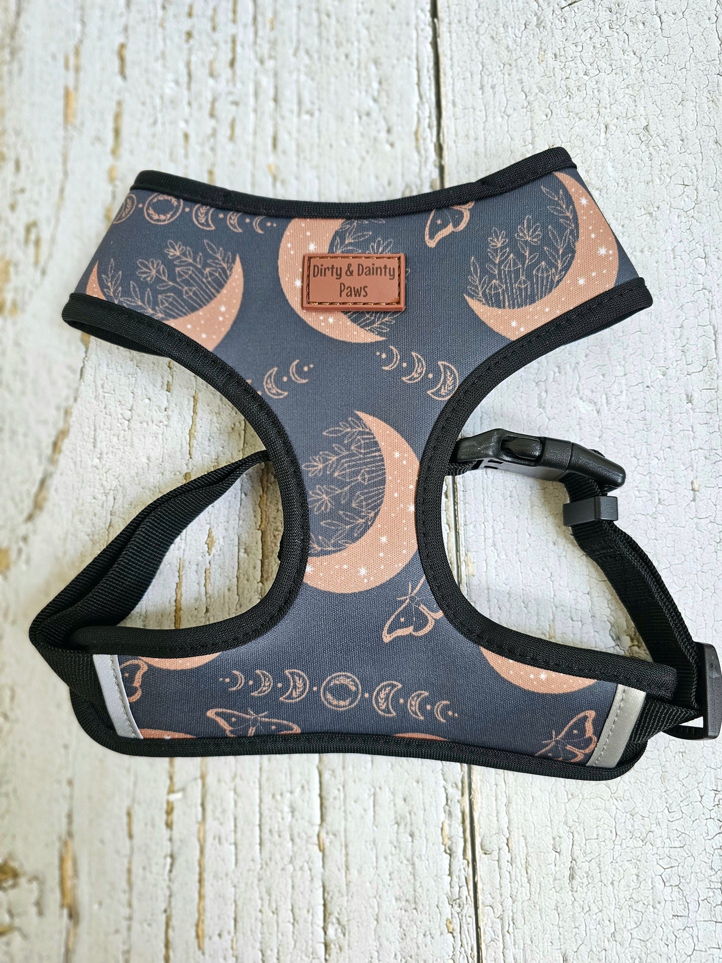 Boho Nights Chest Harness with adjustable straps, heavy-duty buckle, and breathable design. Perfect for outdoor adventures. Machine washable. Featuring moons, moths, lunar moons, and crystals