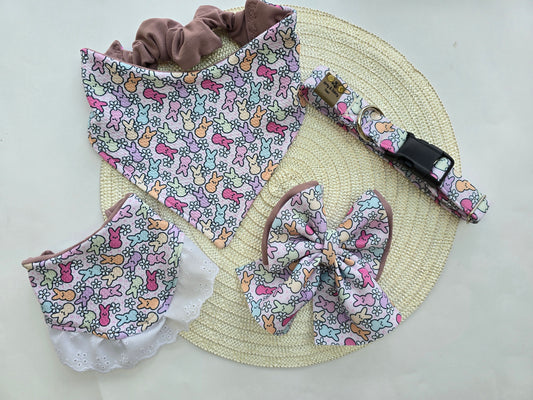 Easter Peeps Reversible Scrunchie Dog Bandana featuring pastel-colored Peeps on one side and a complementary Easter design on the reverse, made from soft Liverpool fabric.