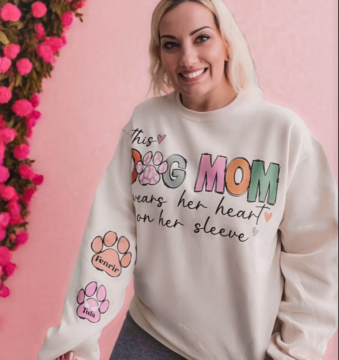 Custom Dog Mom Sweatshirt with "This Dog Mom Wears Her Heart on Her Sleeve" design and personalized paw prints on sleeve