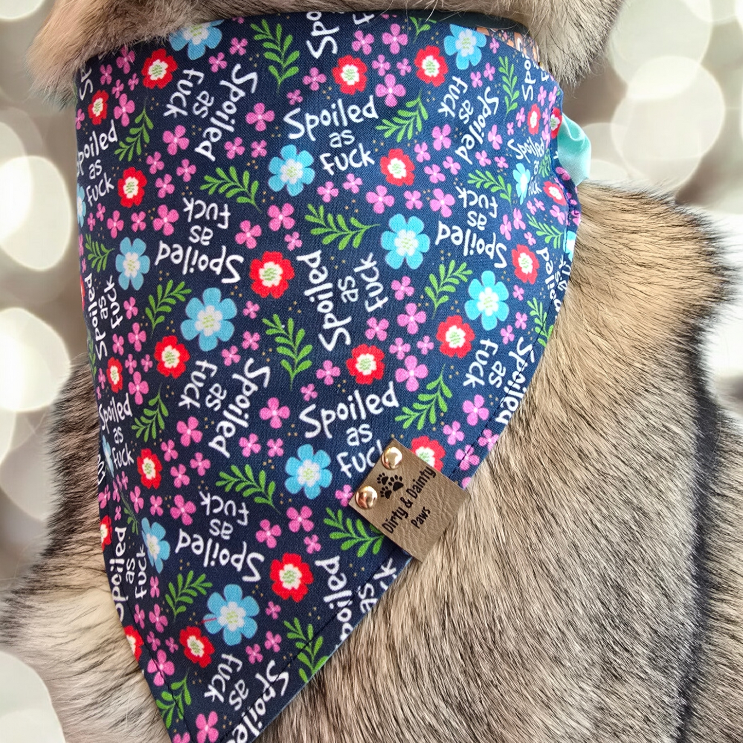 Cozy Cotton scrunchie dog bandana with Spoiled AF floral print

Reversible dog bandana with blue sparkle cotton backing
Funny spoiled dog bandana with floral pattern