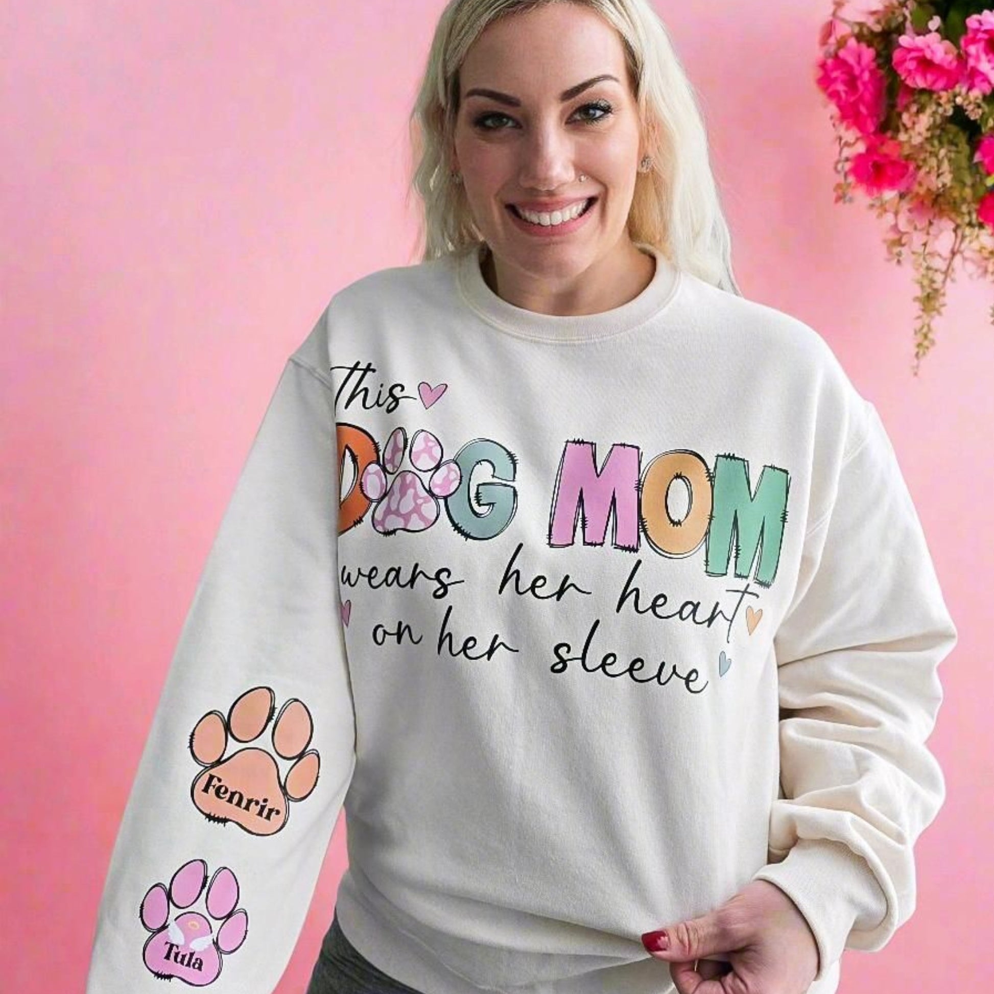 Custom Dog Mom Sweatshirt with "This Dog Mom Wears Her Heart on Her Sleeve" design and personalized paw prints on sleeve