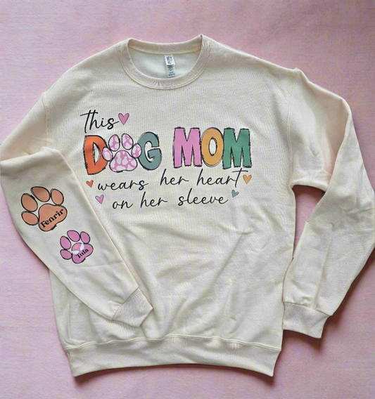 Custom Dog Mom Sweatshirt with "This Dog Mom Wears Her Heart on Her Sleeve" design and personalized paw prints on sleeve