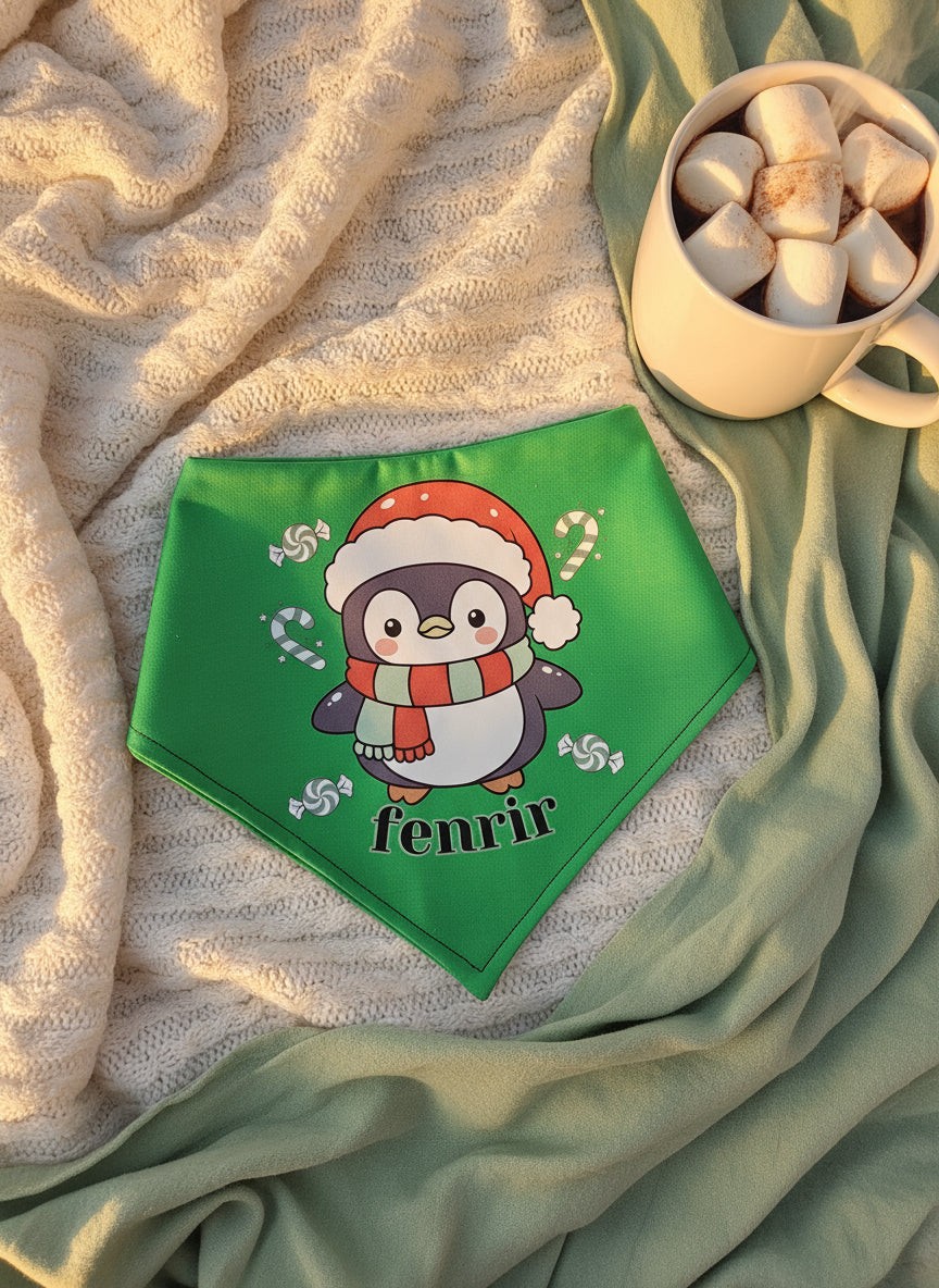 Green bandana with a penguin design and 'fenrir' text on a soft fabric background.