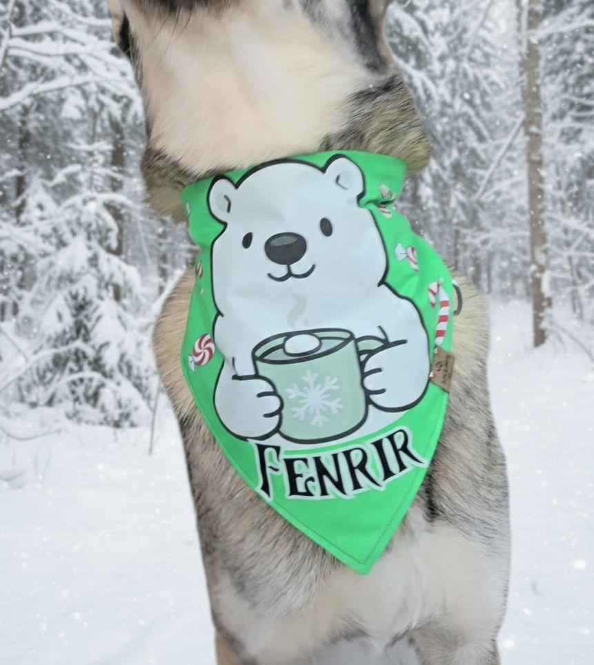 Dog wearing a green bandana with a polar bear design and 'Fenrir' text in a snowy forest setting.