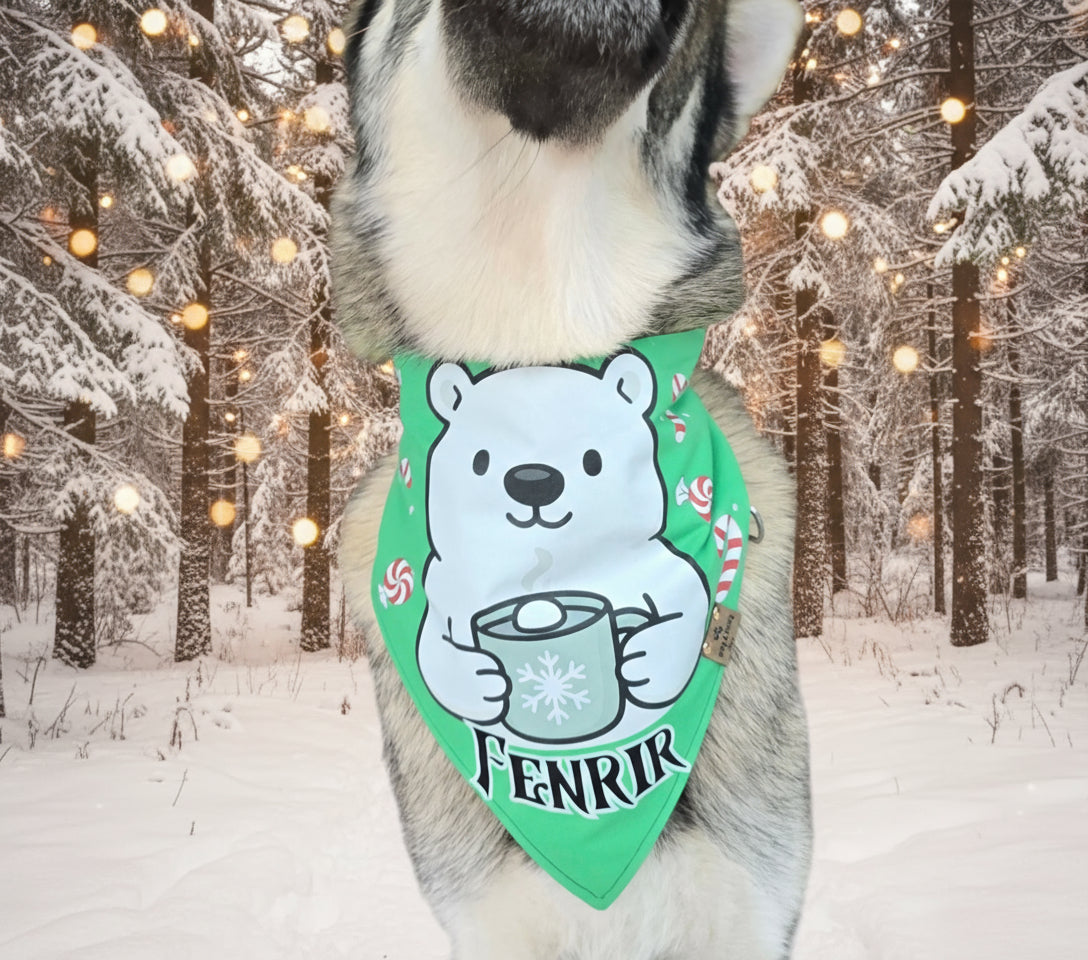 Dog wearing a green bandana with a polar bear design and 'Fenrir' text in a home setting.