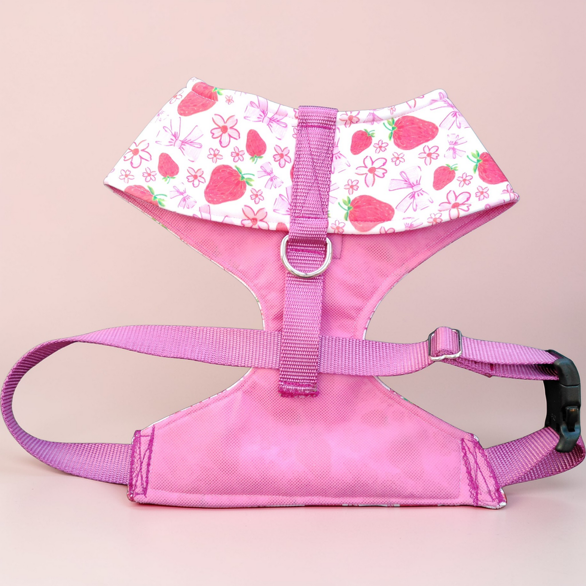 Pink mesh backed dog harness with adjustable straps and metal D-ring