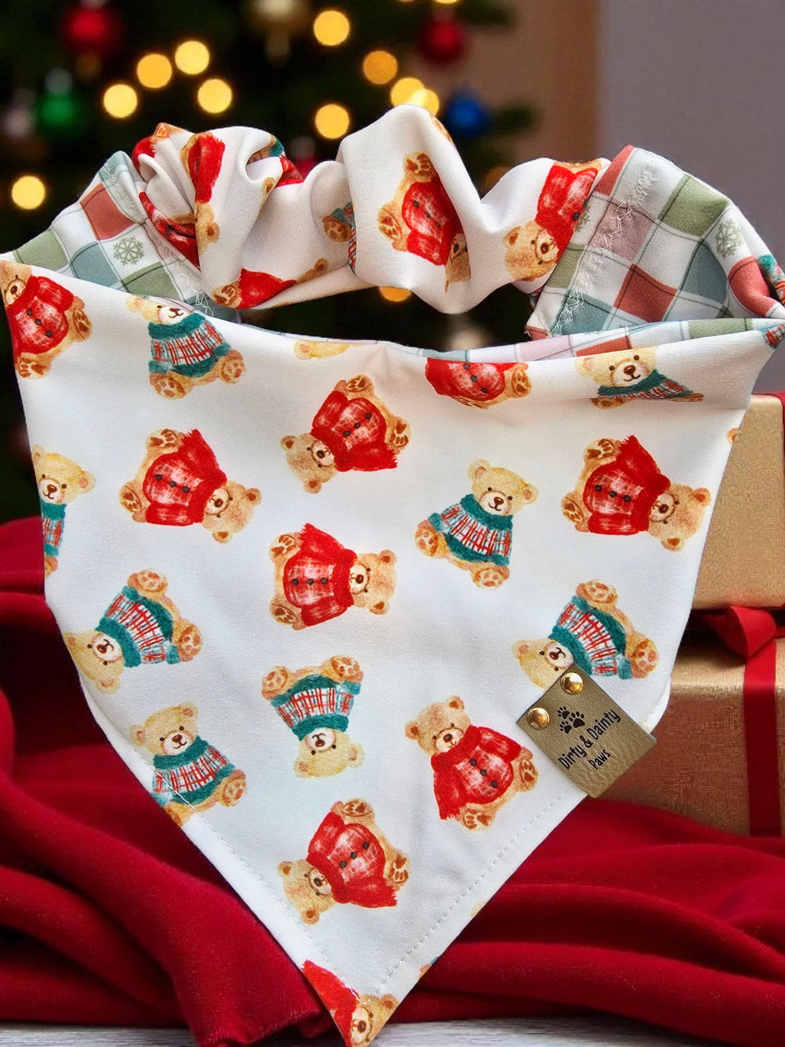 dog bandana with teddy bears in red and green sweaters. scrunchie bandana that is reversible
