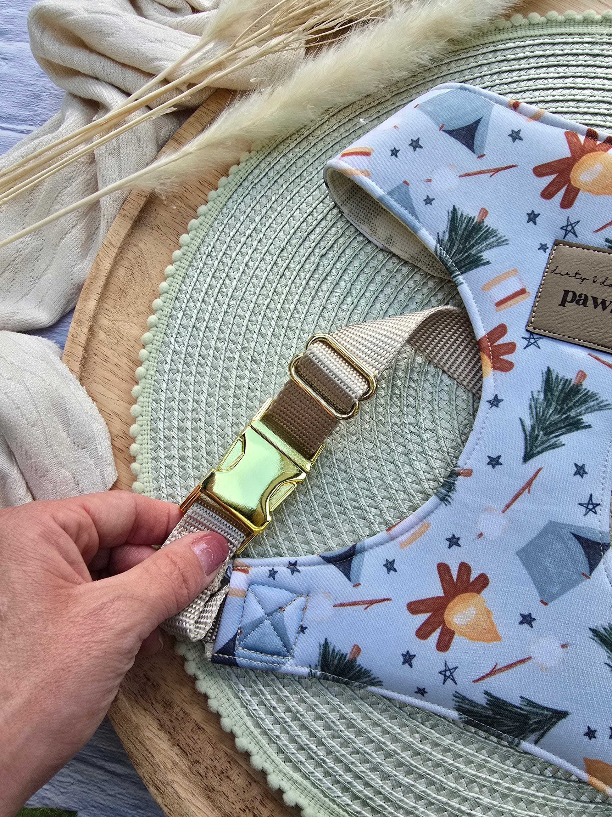 watercolor camping print dog harness with almond color webbing with brass yellow gold hardware, showcasing a yellow gold side release buckle